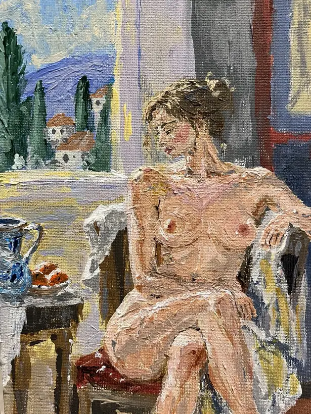 Figurative interior scene with a seated nude model in soft light.